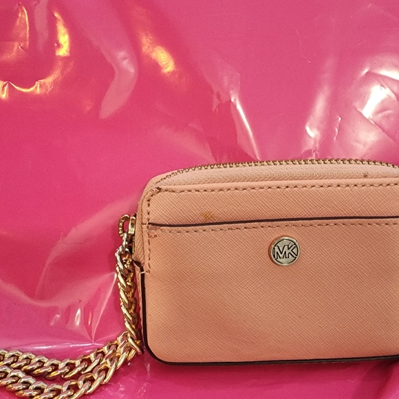 Michael Kors Handbags - Michael Kors Primrose Pink Wristlet Measures 4.5 × 3